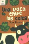 UNA VACA ENTRE LAS COLES
